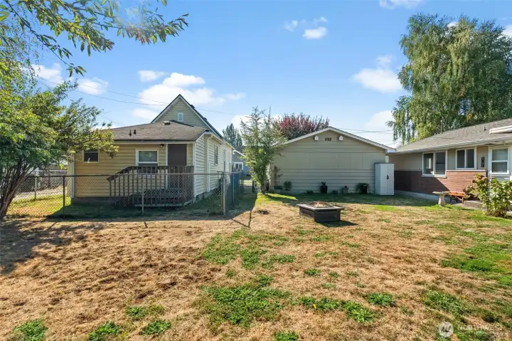 Left to right, back door to DADU, back of garage, and back of main house