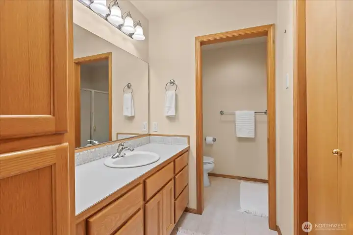 Primary bathroom with walk-in closet.