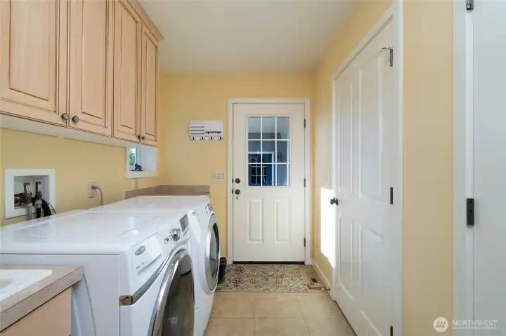 Laundry room with utility sink.