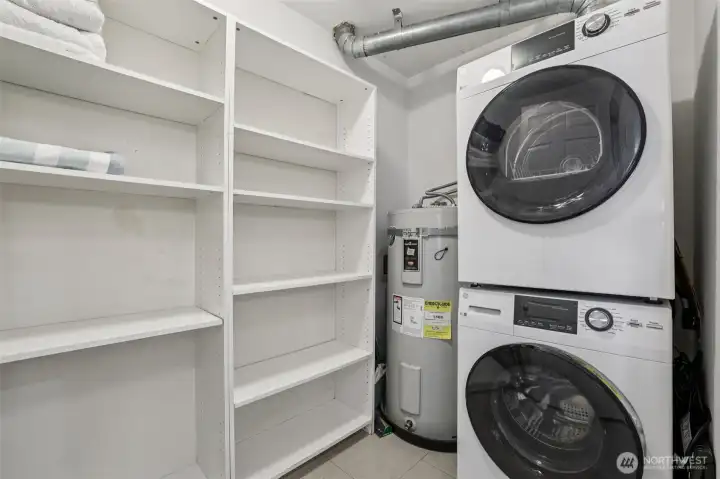 In-unit laundry is included in the sale, and the laundry room has tons of extra storage space!