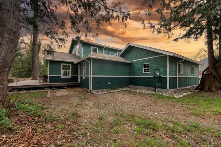 Side elevation showcasing the home and an oversized garage.