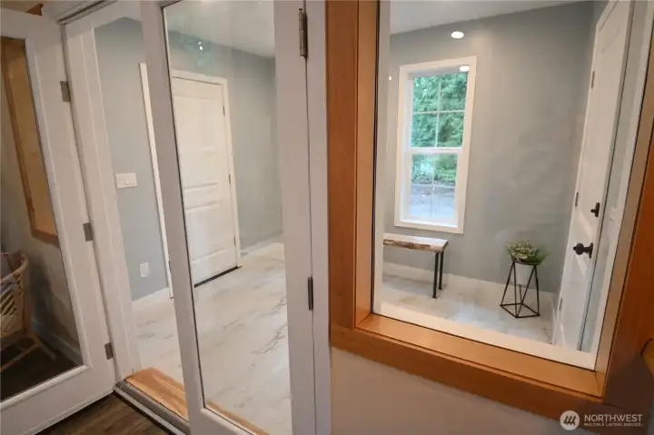 Bright and welcoming dining with direct access to the outdoor deck, perfect for indoor-outdoor living and entertaining.