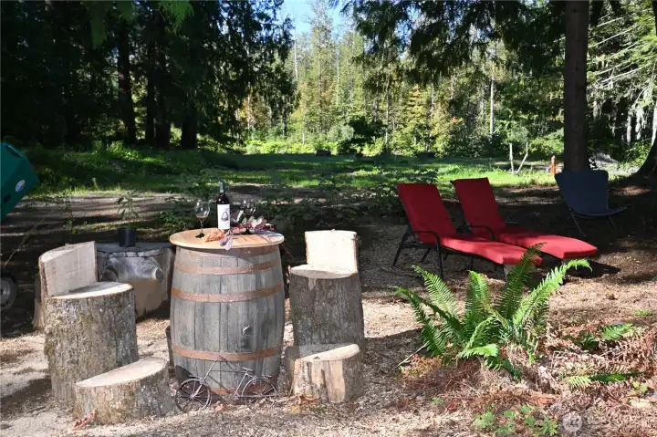 Entertain with friends ~ rustic bar seating in natures setting.
