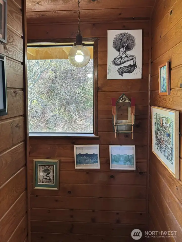 Coming up the stairs.