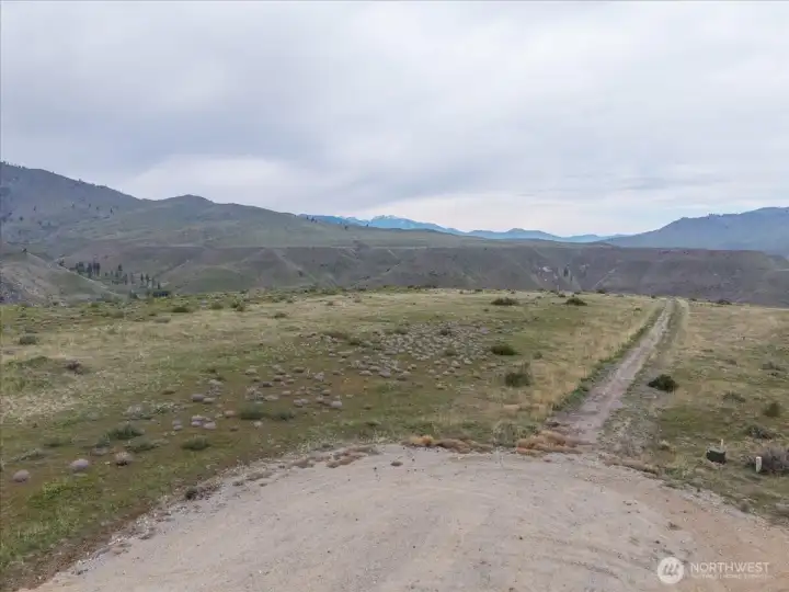 3-4 acres of flat land on top of the bluff with roadway to additional building site