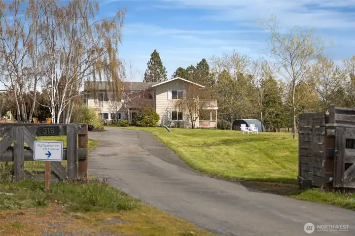 View from the road into the fenced property