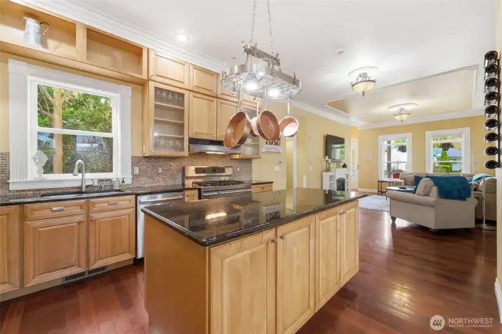 Verstile and spacious kitchen with granite island and countertops