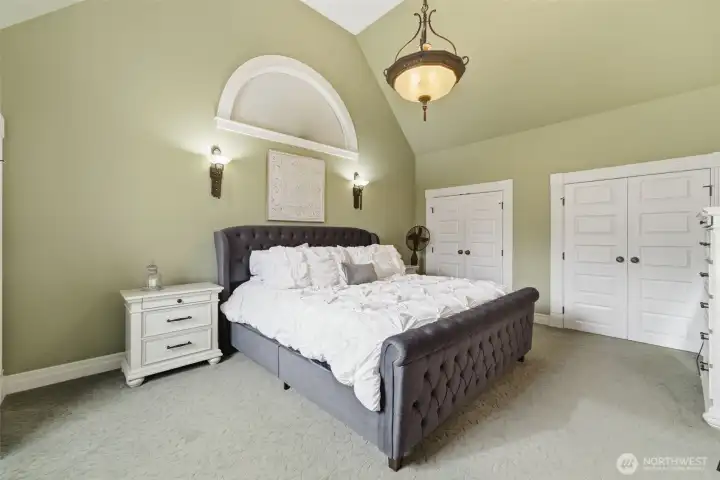His and hers closets in primary bedroom