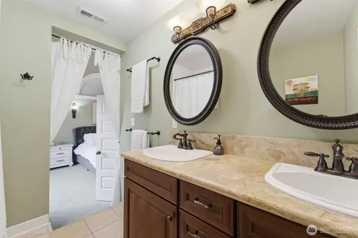 En-suite bathroom with double vanity sink