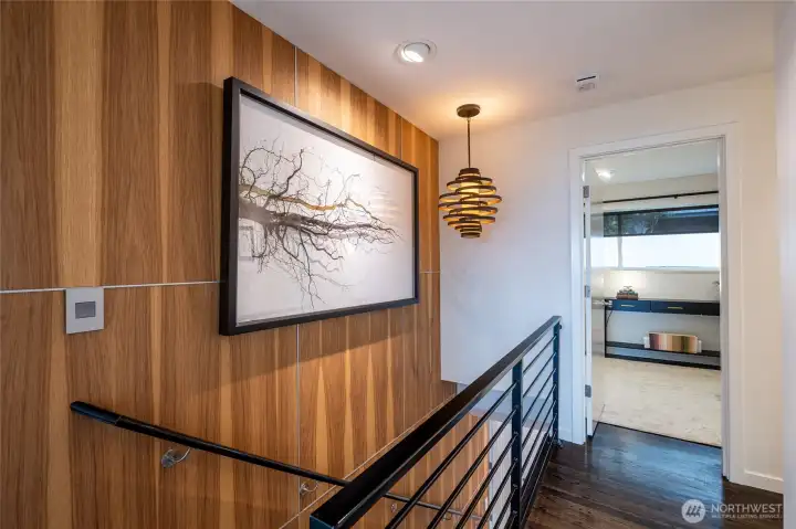 Custom vertical grain hickory art wall. Custom vertical grain hickory art wall.