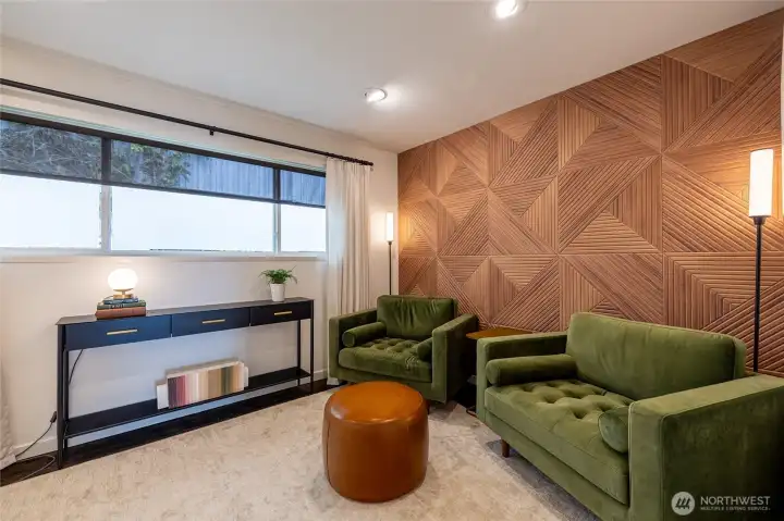 Main floor guest bedroom #1 with retro design sound wall. Main floor guest bedroom #1 with retro design sound wall.