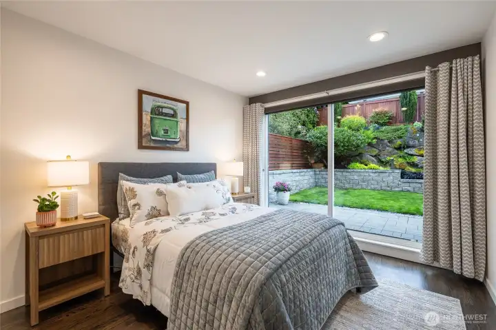 Guest bedroom #2 connects to the backyard. Guest bedroom #2 connects to the backyard.