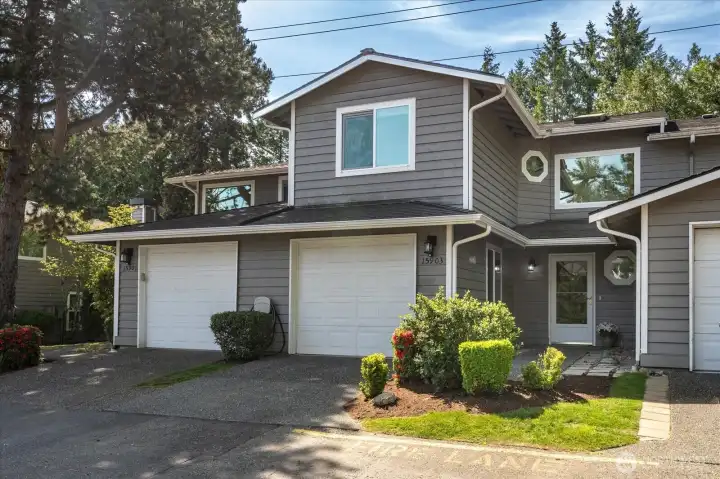 Practical everyday convenience with an attached one-car garage plus dedicated driveway parking for an additional vehicle.