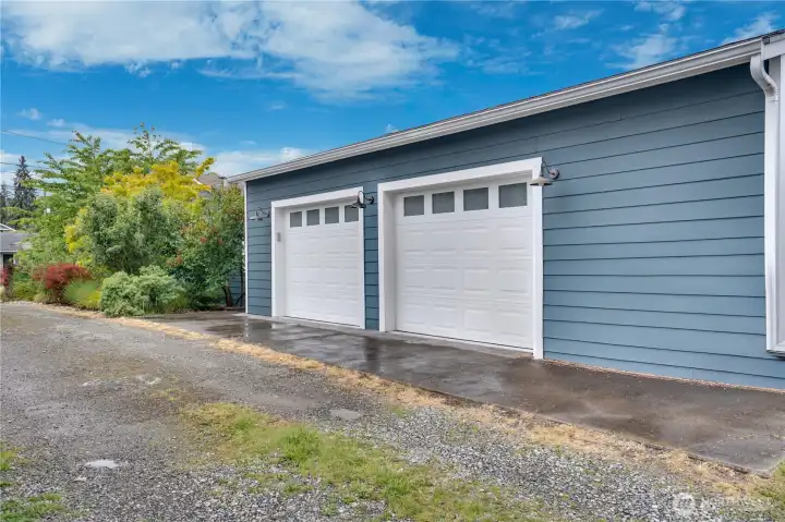 In addition to the main garage at the front of the home, you’ll find a spacious detached 2-car garage off the alley complete with finished floors and walls, electrical, and plenty of room for projects, hobbies, or workshop space.