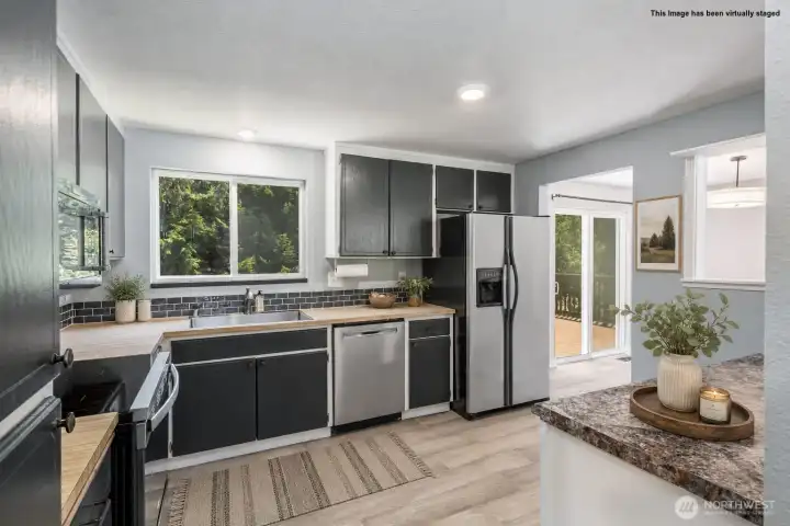 Kitchen with dining area thru the door on the right