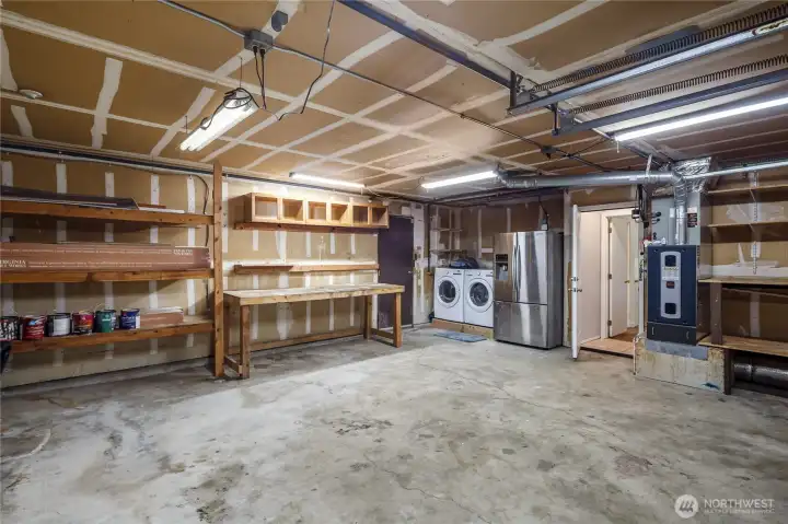Interior of Garage. Door to the backyard.
