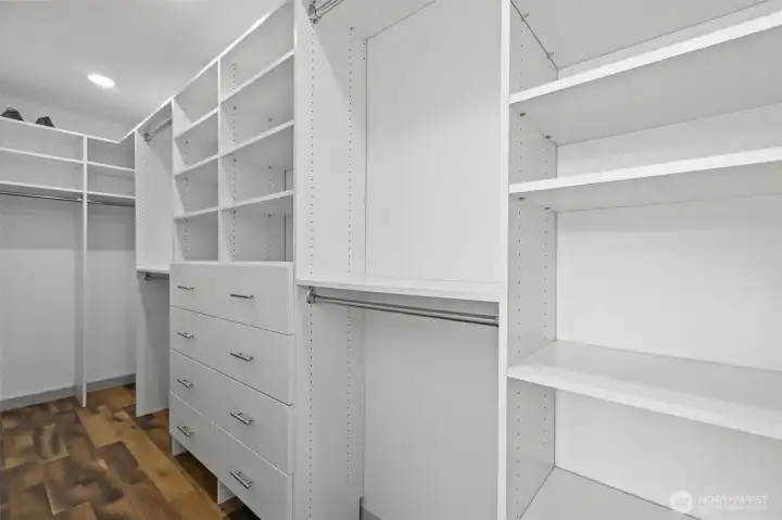 Huge walk-in closet with built in shelving Huge walk-in closet with built in shelving