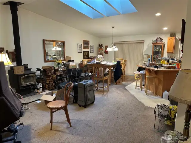 Living Room looking into Dining and Kitchen