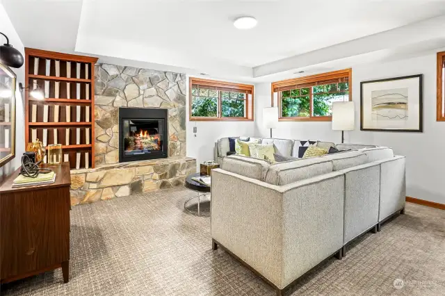 Large Lower-level rec room with gas fireplace