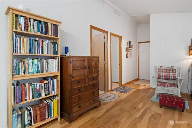 Second and third bedrooms on the left, full bath on the right & attached garage down the hall.