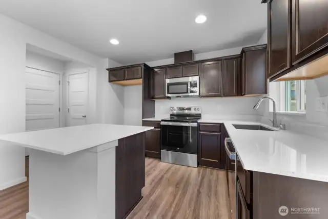 Photographs are for illustrative purposes only. Features, finishes, interior/exterior colors, landscaping and floorplan shown may vary from actual homes built.