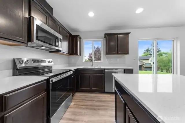 Photographs are for illustrative purposes only. Features, finishes, interior/exterior colors, landscaping and floorplan shown may vary from actual homes built.