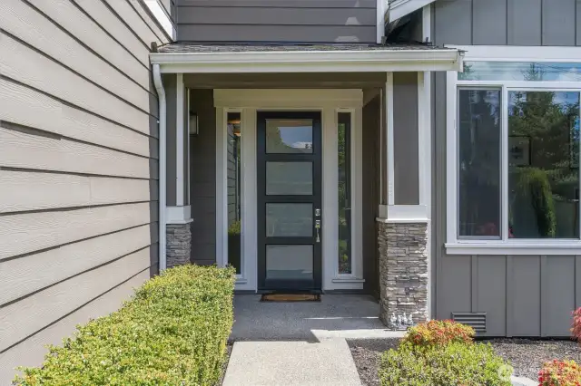 Covered entry with modern touches
