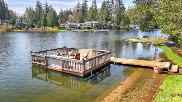 Your own waterfront oasis with private dock includes extended peninsula with amazing views.