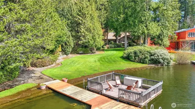 Private dock with detachable, motorized floating barge for enjoying Pine Lake.