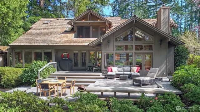 Thoughtfully designed with primarily main-level living, the home offers effortless access to outdoor spaces—perfect for seamless indoor-outdoor living and easy everyday enjoyment with gorgeous views of the lake.