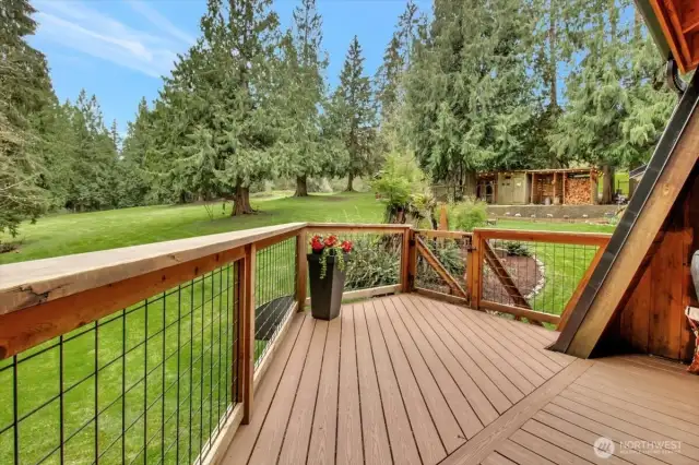 The portion of the deck that's not covered.  The gate goes down the stairs to the propery.