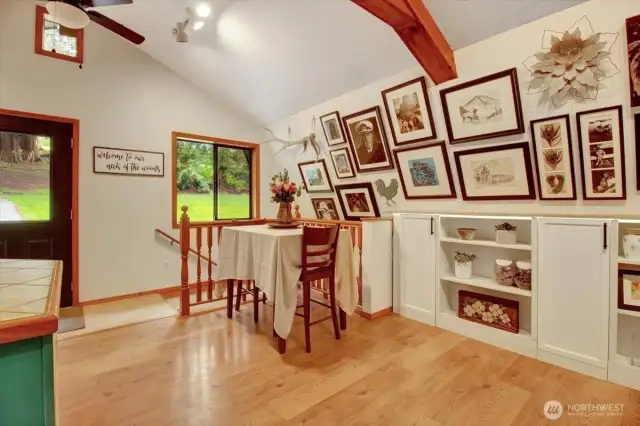 The dining area and stairs to the lower level