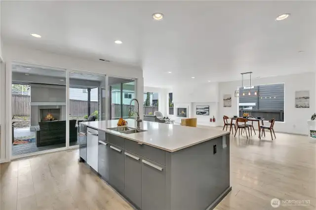 The flow is seamless from the indoor living room to the covered outdoor living room.