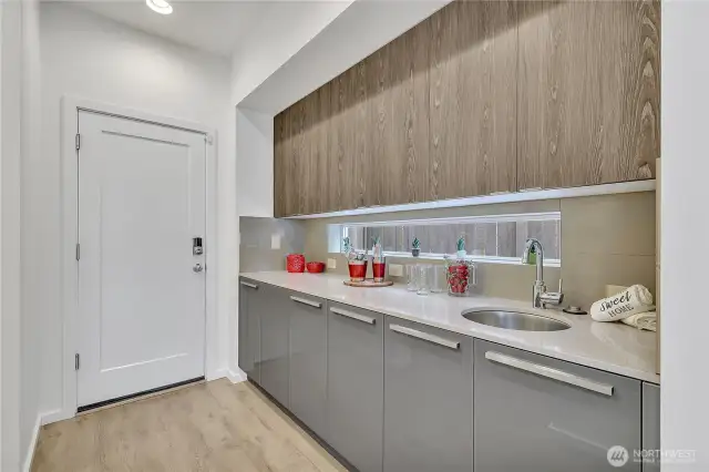 The wet-bar has more storage than some kitchens do!