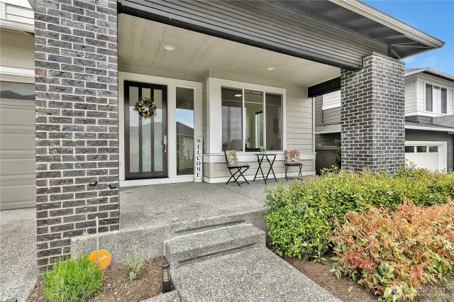Imagine yourself enjoying the summer sunset from your covered front porch.