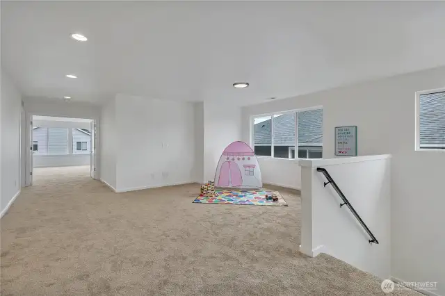 The bonus room at the top of the stairs is a wonderful space offering many possible uses.
