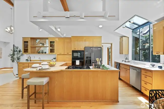Kitchen complete with island seating and wet bar.