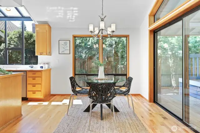 Informal dining located off the kitchen and family room. Slider door leads to the backyard.