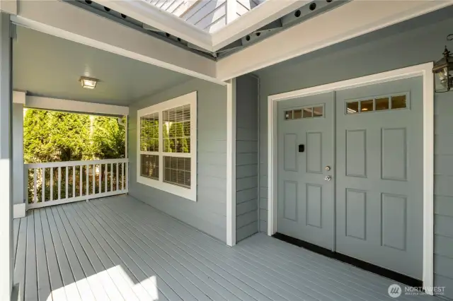 Covered entry porch to enjoy summer evenings.