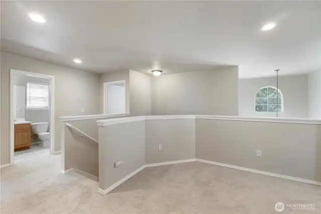 Huge upstairs landing open to all bedrooms & bath.