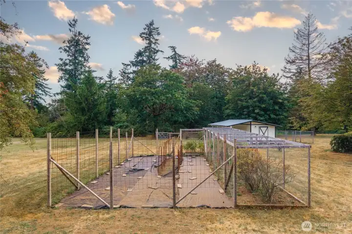 Fully fenced garden w/ raised beds