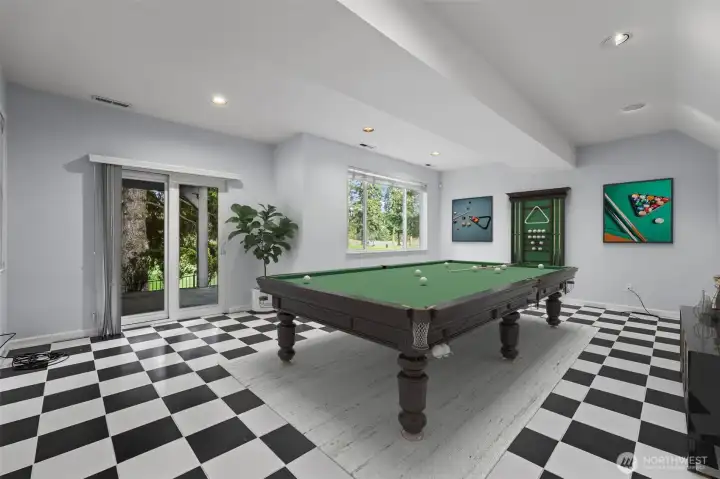 Giant basement. Home Gym/2nd living area/rec room. This photo is virtually staged.