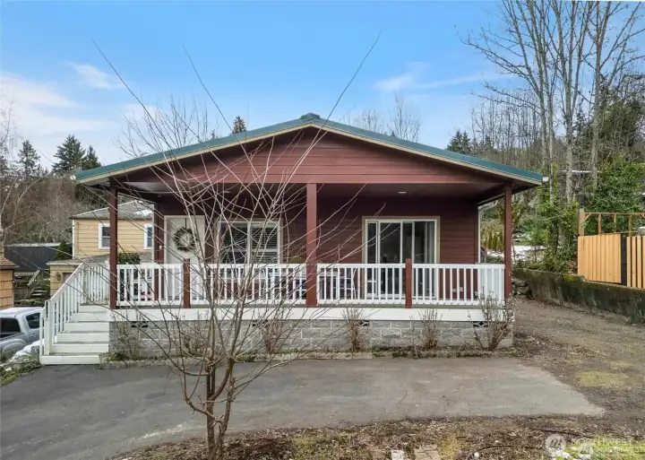 Enjoy the views of siclair inlet, moutains,eagles and water and eagles from  covered front porch.