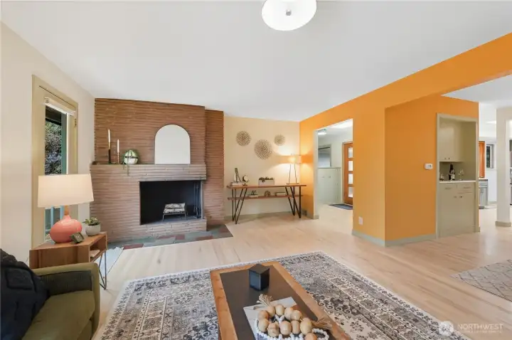 Original Mid-Century Modern fireplace in spacious living room.
