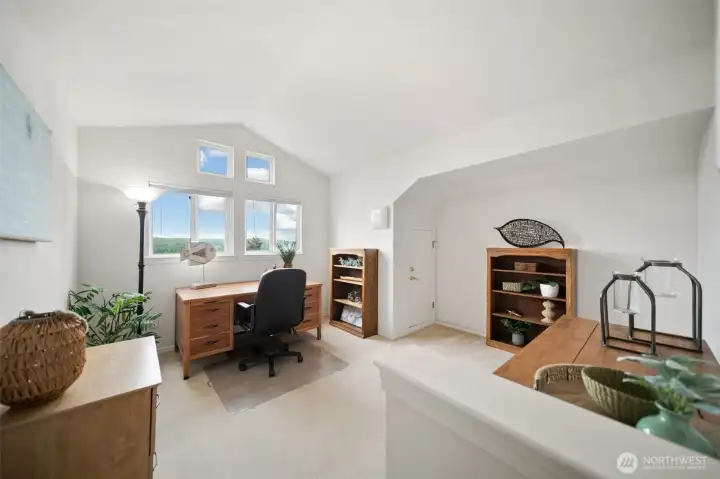 Discover a versatile upstairs office space, perfect for work or study, with a stunning view to inspire productivity!