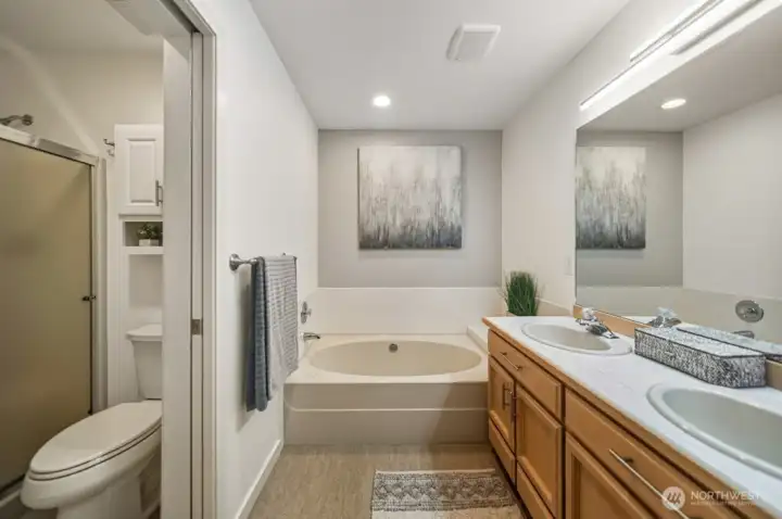 The private bath features a luxurious soaking tub and a spacious walk-in shower—exactly what you’ve been dreaming of!
