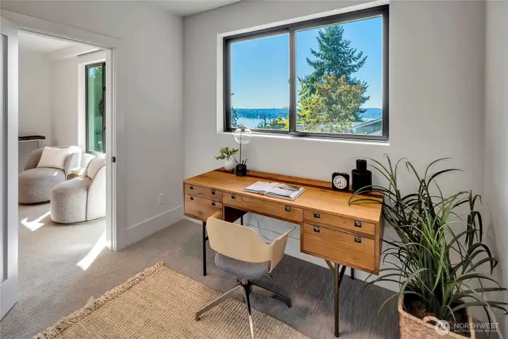 Great extra space off of the primary suite to use as an office, nursery, workout room or extra closet!