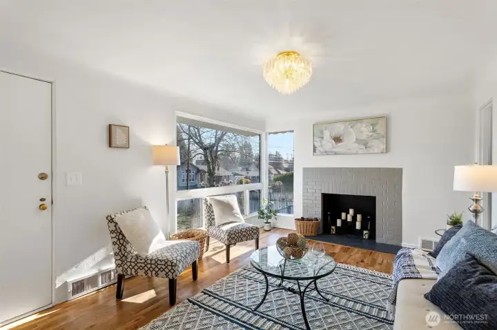 The fireplace anchors the room, creating an easy and comfortable setting for everyday living.