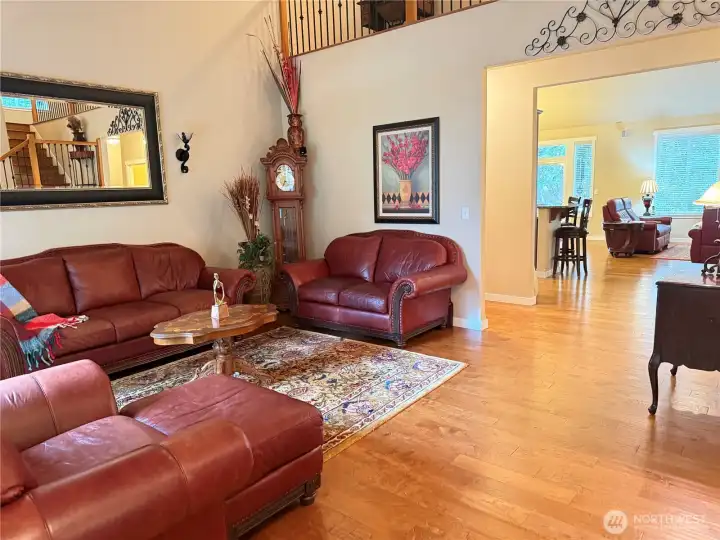 Parlor at entry and engineered hardwood flooring throughout.