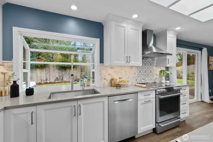 Garden window overlooking backyard.